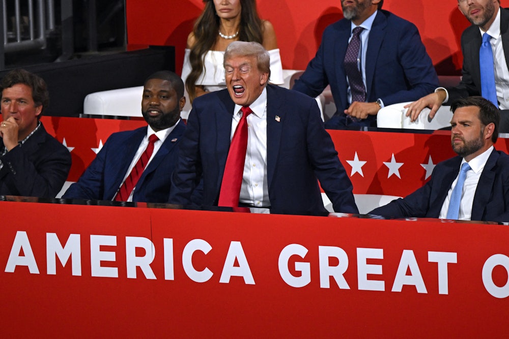 Trump flanked by manly men