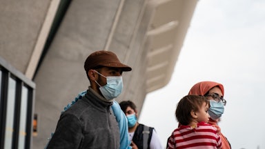 Evacuees fleeing Afghanistan arrive at Dulles International Airport in Northern Virginia.