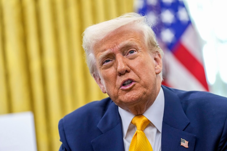 Donald Trump speaks to reporters in the Oval Office