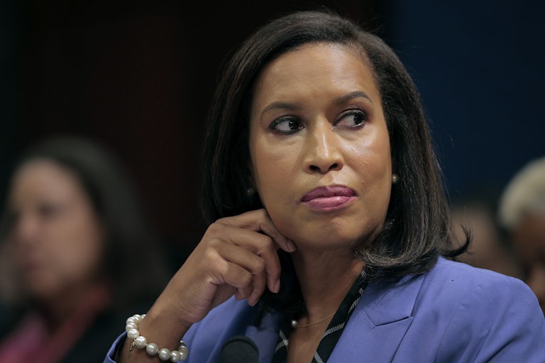 D.C. Mayor Muriel Bowser looks to the side as she testifies.
