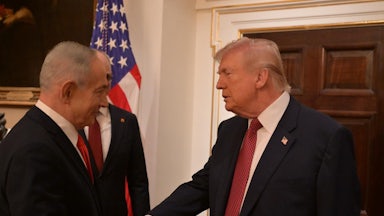 Donald Trump and Israeli Prime Minister Benjamin Netanyahu shake hands at the White House