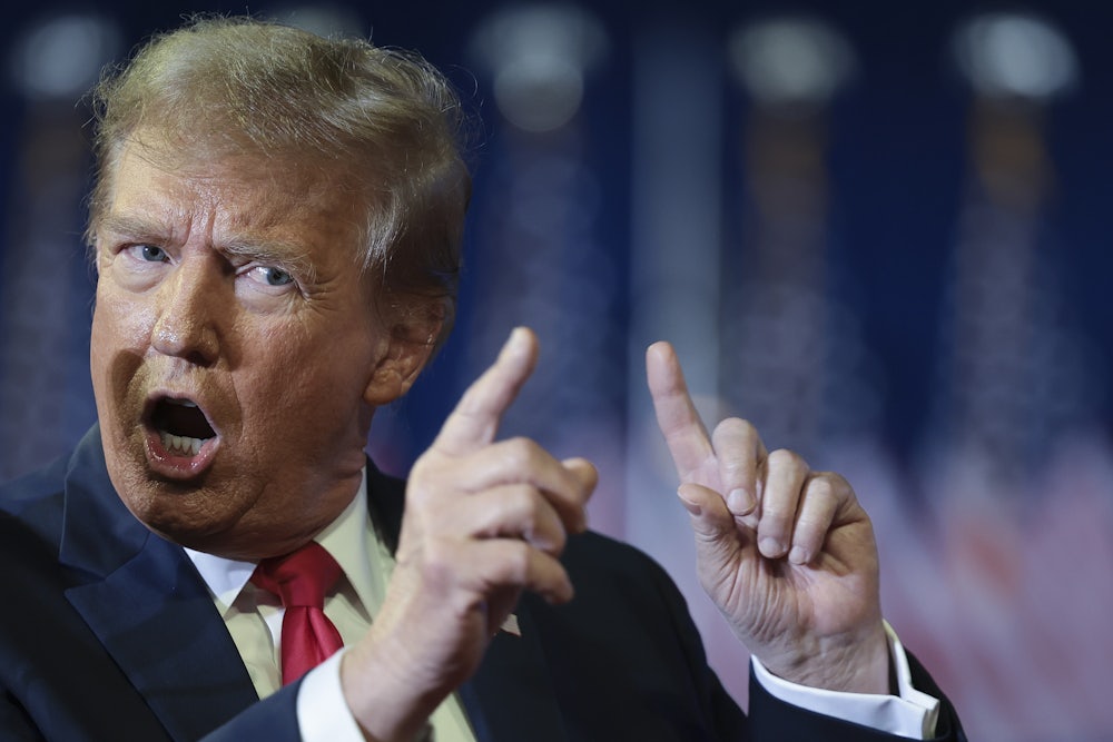Donald Trump mocks U.S. President Joe Biden while speaking during a Get Out The Vote rally at Coastal Carolina University.