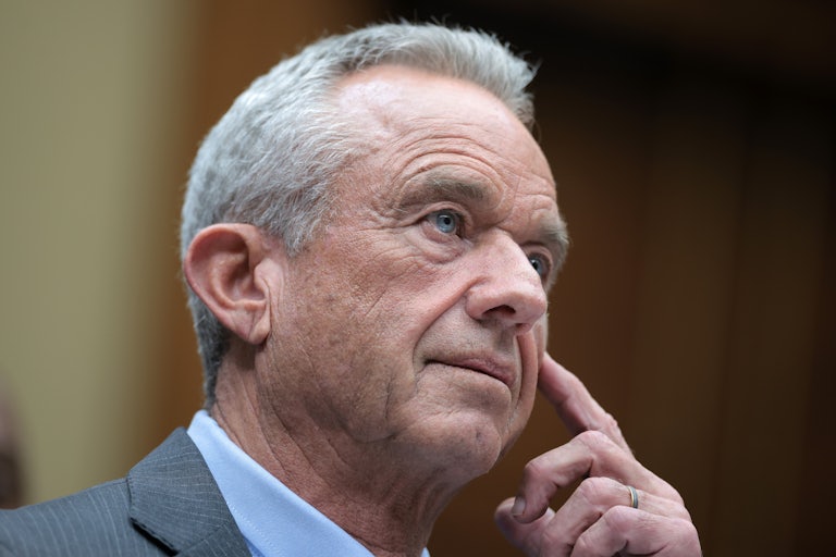 Trump's HHS Secretary RFK Jr. listens at a senate hearing.