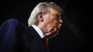 Donald Trump speaks to reporters after the Knicks game