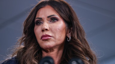 Homeland Security Secretary Kristi Noem frowns