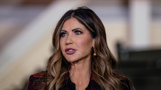 Kristi Noem is seen here from the shoulders up, looking off to the side of the camera.