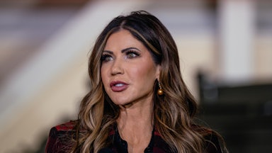 Kristi Noem is seen here from the shoulders up, looking off to the side of the camera.