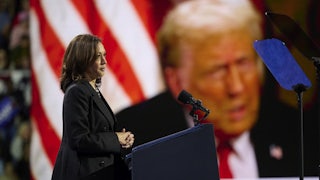 Kamala Harris shows video of Donald Trump at a campaign event in Erie, Pennsylvania.