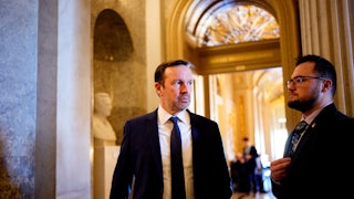 Democratic Senator Chris Murphy walks to a meeting.