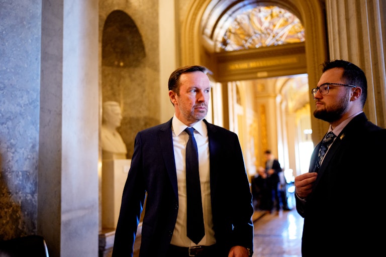 Democratic Senator Chris Murphy walks to a meeting.
