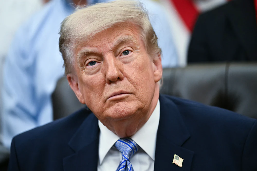 Donald Trump stares listlessly