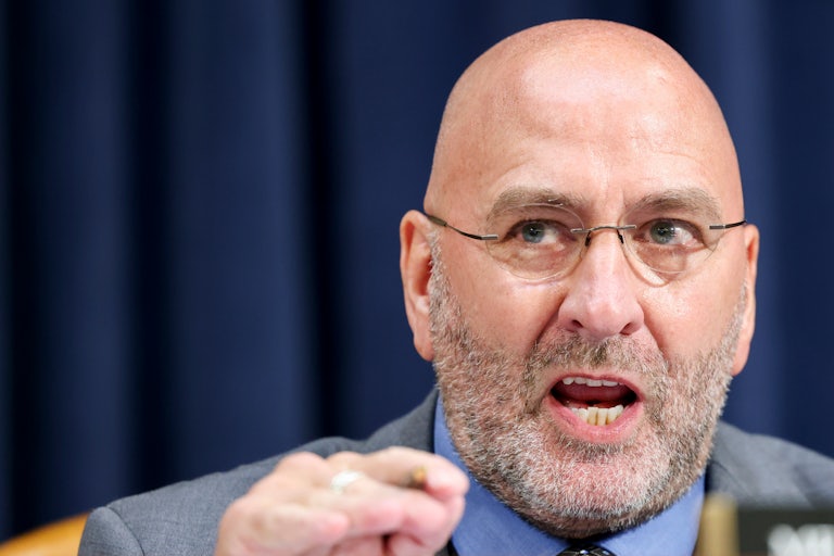 Representative Clay Higgins (an old bald white man) speaks in Congress.