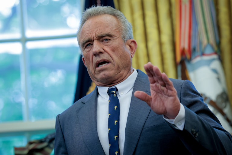 Robert F. Kennedy Jr. gestures while speaking in the Oval Office