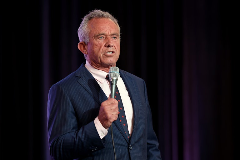 Robert F. Kennedy Jr. speaks with a mic in his hand