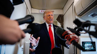 Trump speaking to reporters aboard Air Force One