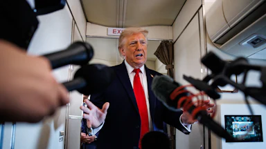 Trump speaking to reporters aboard Air Force One