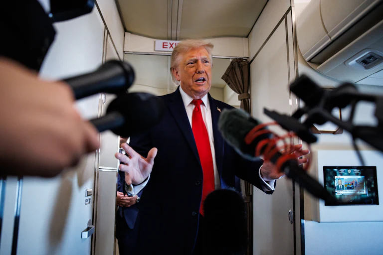 Trump speaking to reporters aboard Air Force One