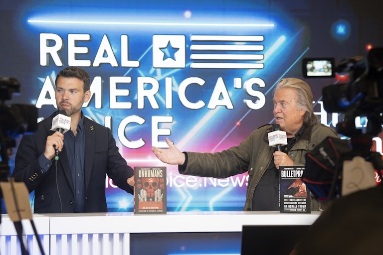 Far-right activist Jack Posobiec and former Trump adviser Steve Bannon broadcast live during Turning Point USA's 2024 AmericaFest at the Phoenix Convention Center.