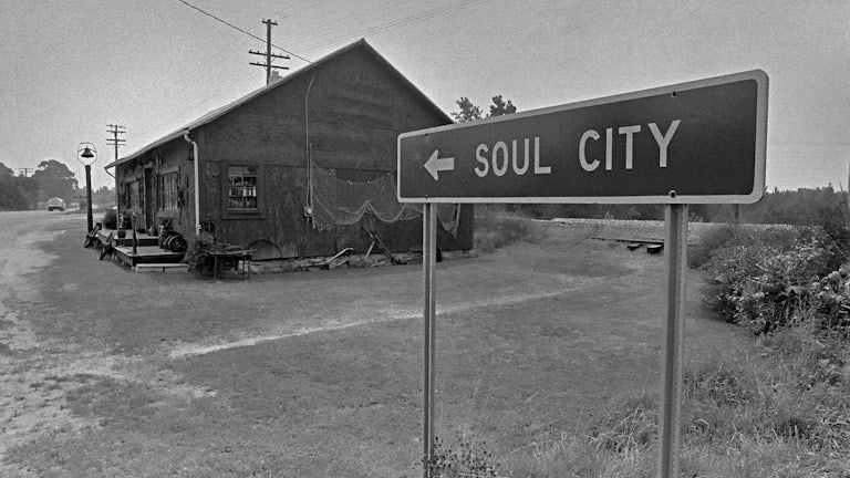 A highway sign for Soul City on Route 1.