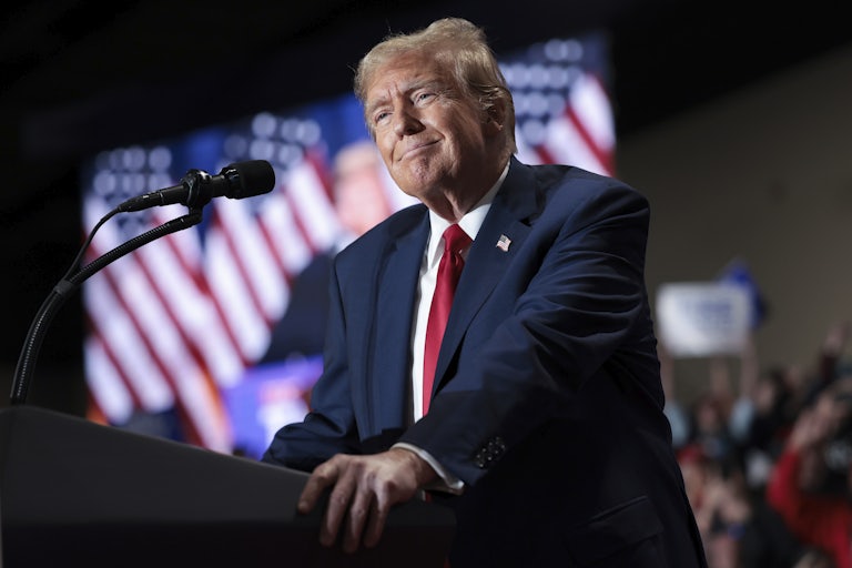 Donald Trump standing at a lectern