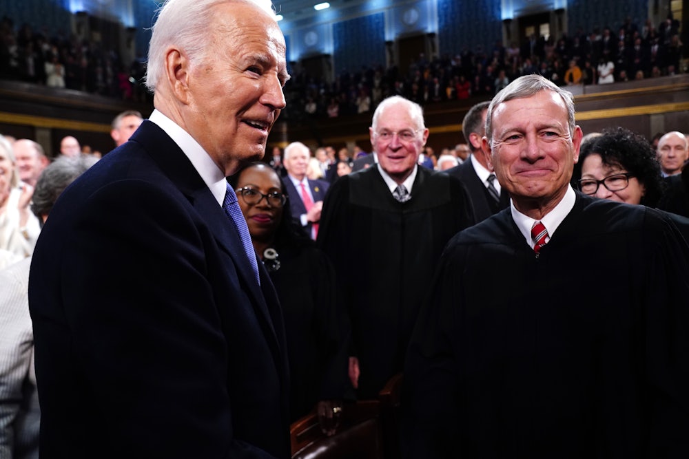 Biden greets Chief Justice John Roberts at the State of the Union address