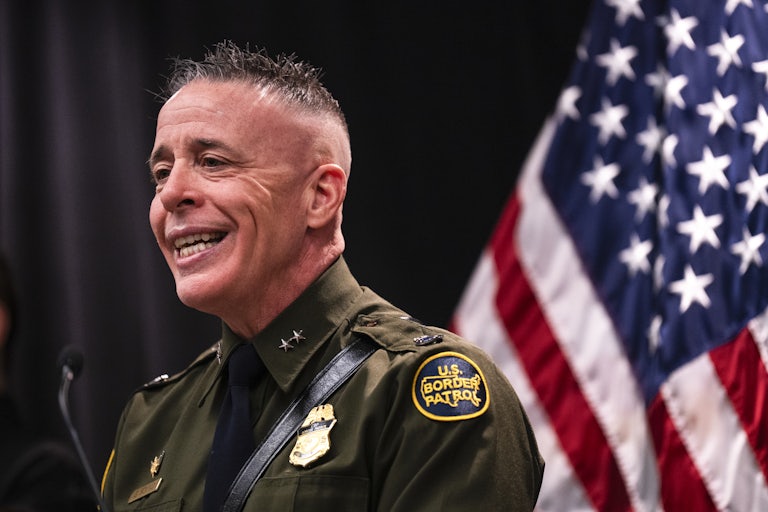 Customs and Border Protection Commander Gregory Bovino smiles while speaking during a press conference in Minneapolis, Minnesota