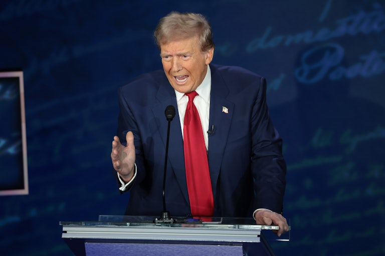 Donald Trump gestures while speaking during the presidential debate