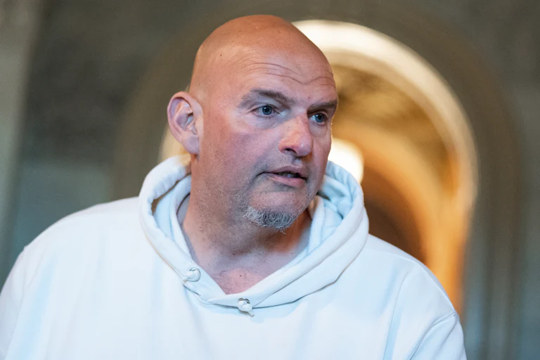 Senator John Fetterman looks to the side