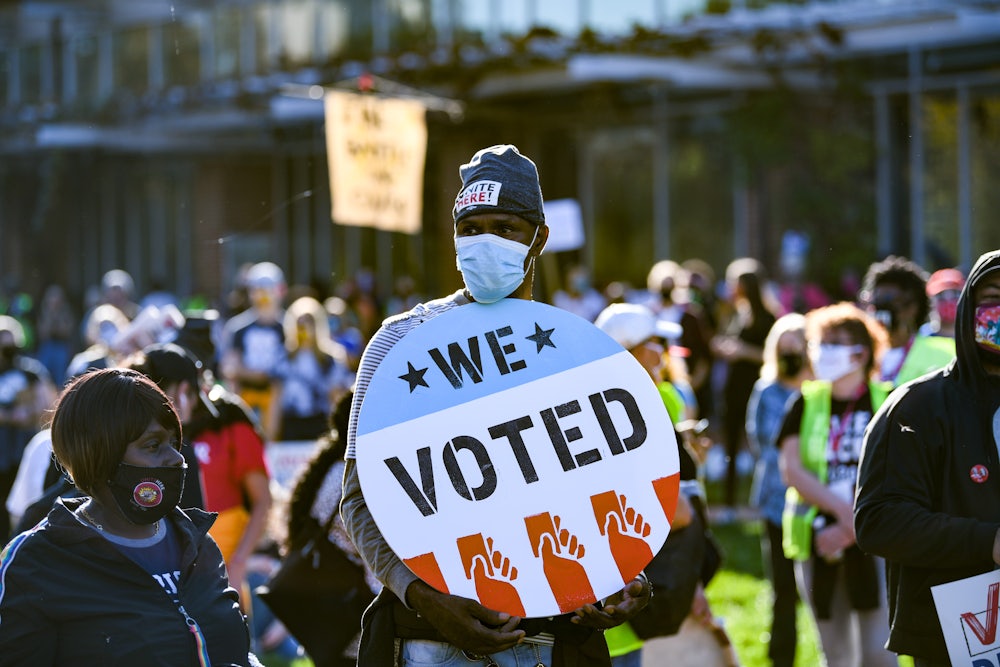 A view of voting rights signs as people gather during the Count Every Vote Rally In Philadelphia.