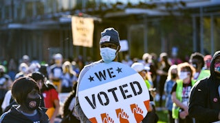 A view of voting rights signs as people gather during the Count Every Vote Rally In Philadelphia.