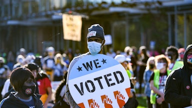 A view of voting rights signs as people gather during the Count Every Vote Rally In Philadelphia.