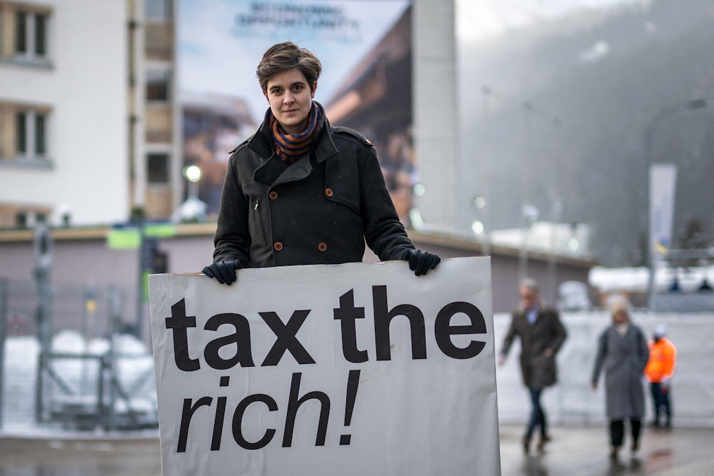 Austrian Marlene Engelhorn with "tax the rich" sign