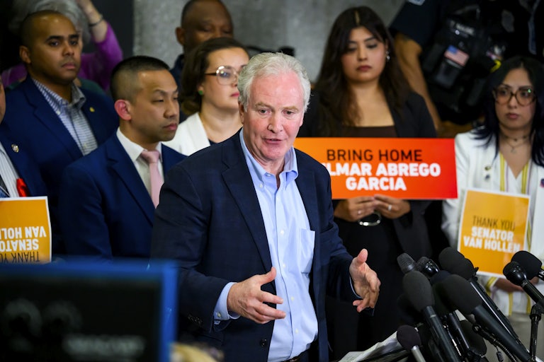 Senator Chris Van Hollen gestures while speaking at a press conference about his trip to El Salvador to see Kilmar Abrego García