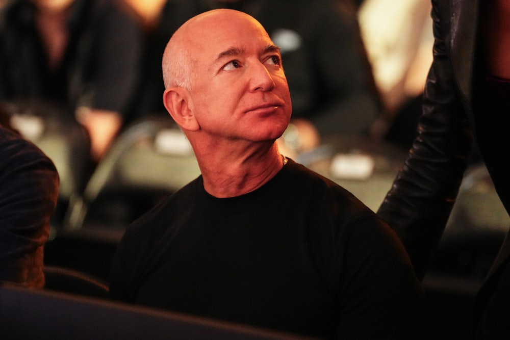 Jeff Bezos glances upward