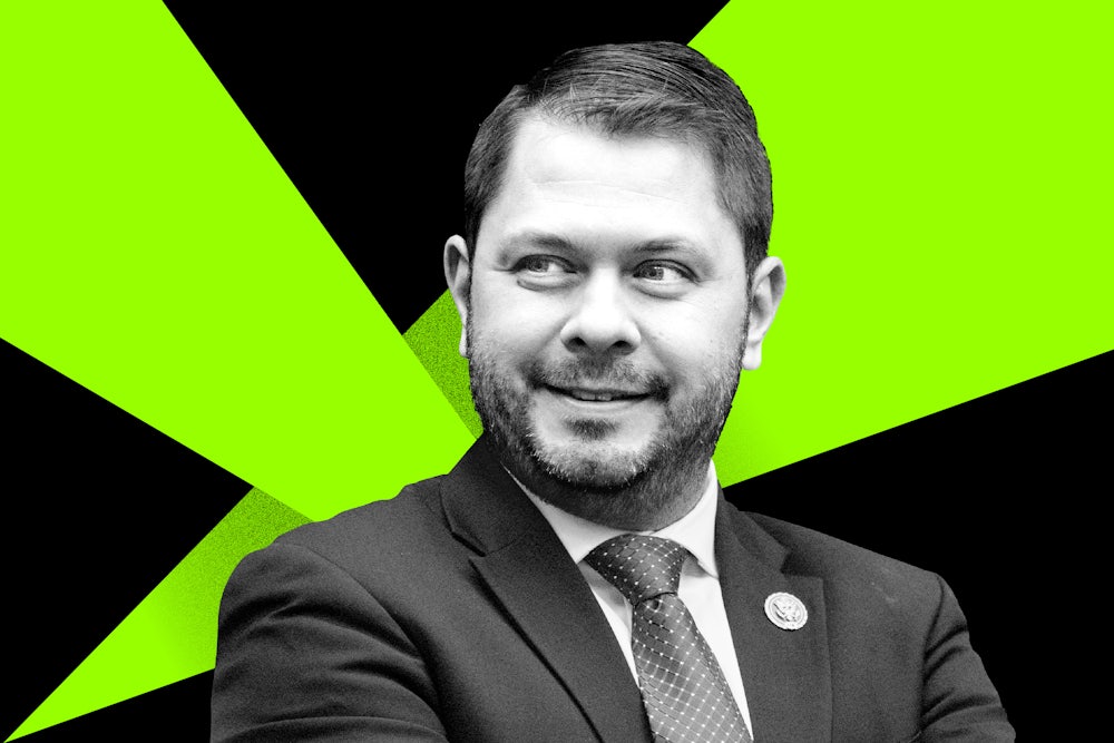 Arizona congressman Ruben Gallego in front of a green and black background