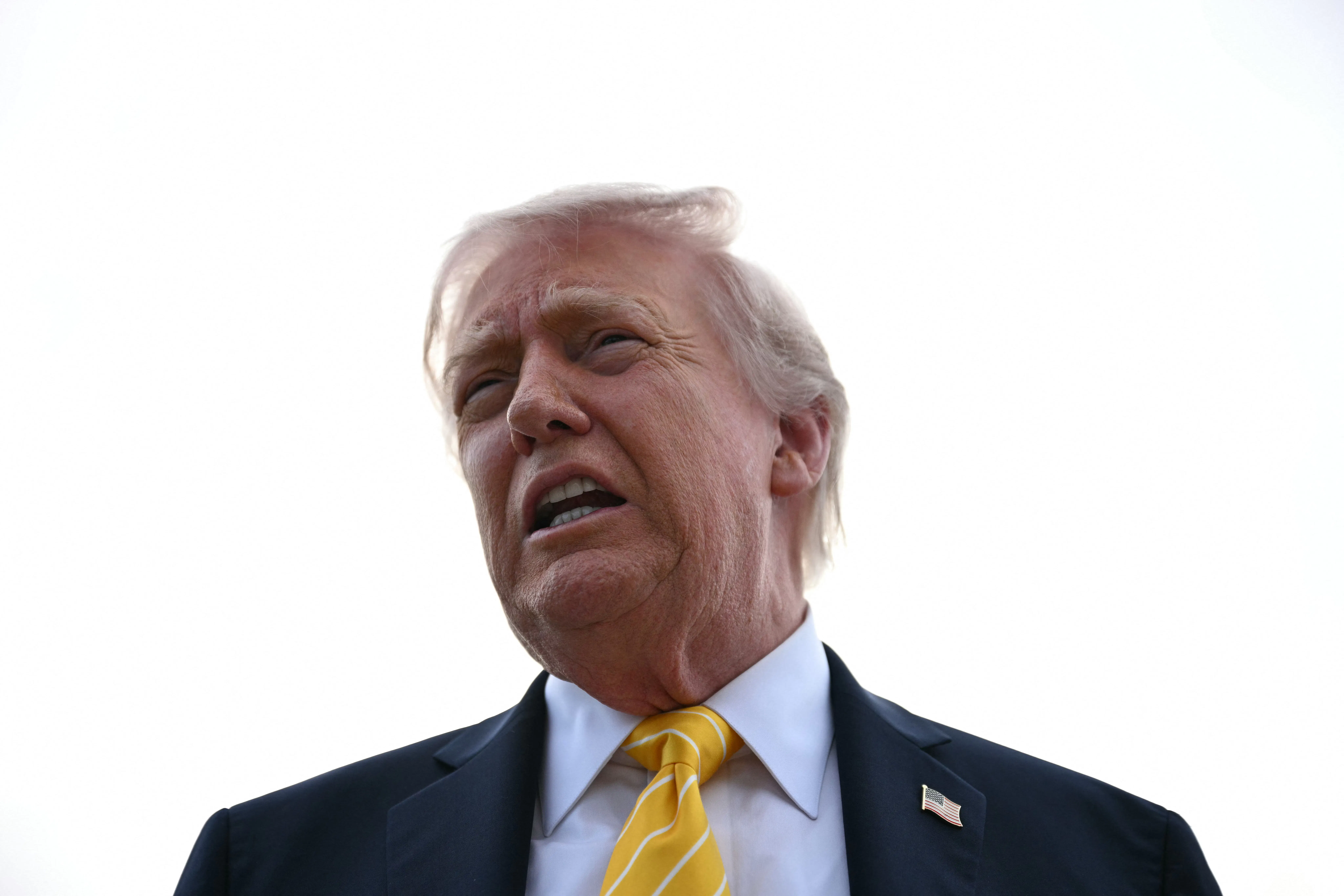 Donald Trump speaks to reporters