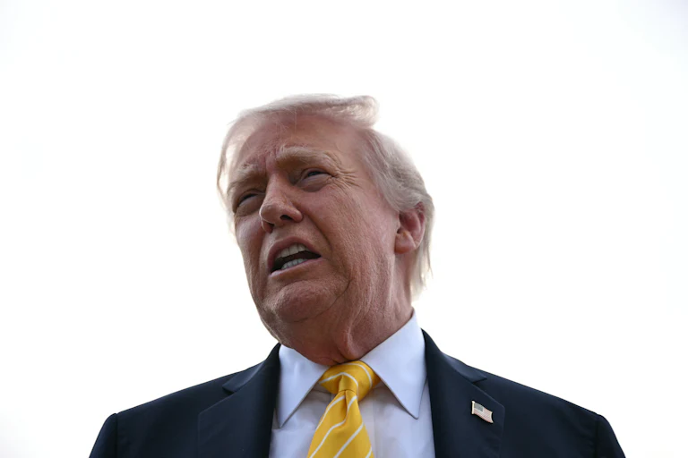 Donald Trump speaks to reporters