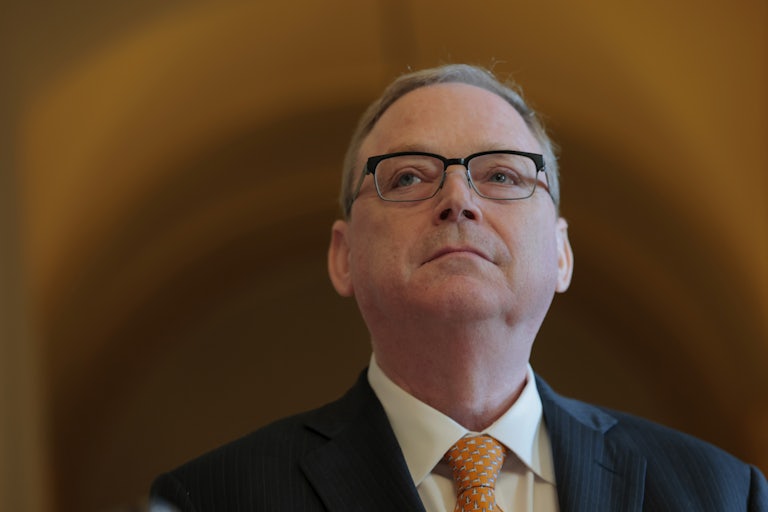 National Economic Council Director Kevin Hassett stands in the Capitol