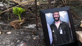 framed photo of Alex Pretti on the ground