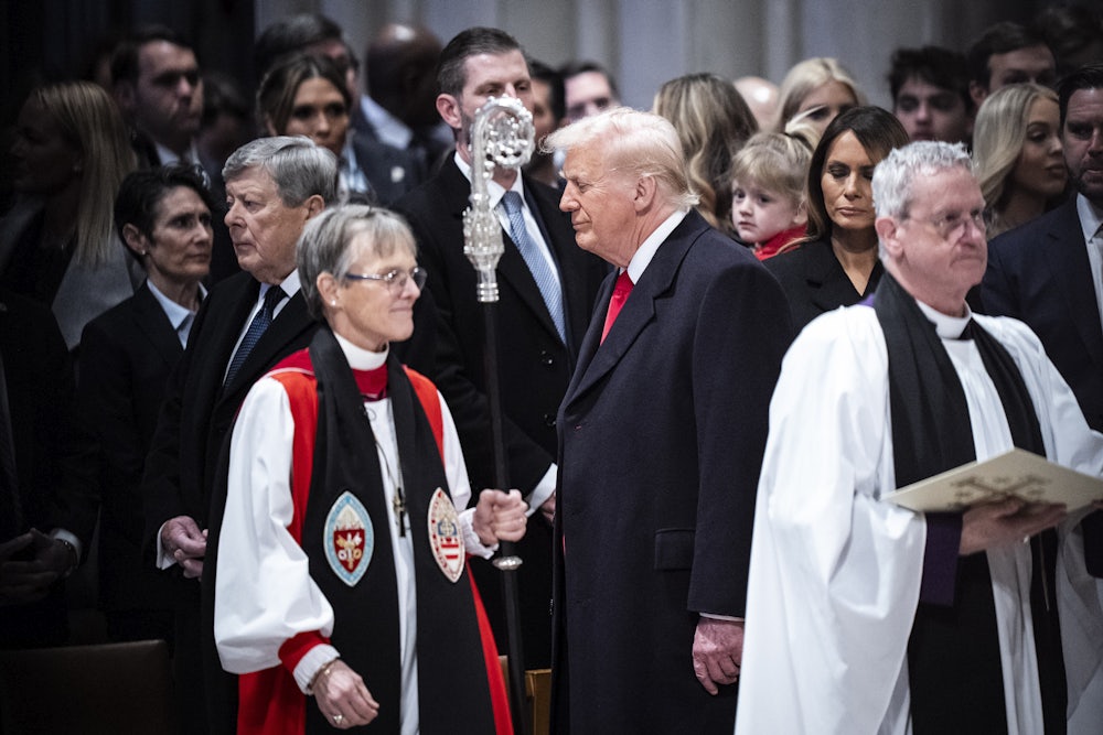 President Donald Trump looks at Rev. Mariann Budde as he attends the national prayer service at the Washington National Cathedral on Tuesday, Jan 21, 2025 in Washington, D.C.