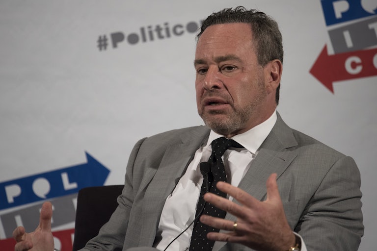 David Frum speaks at a panel.