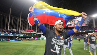 Luis Arraez of Team Venezuela celebrates on the field after winning the 2026 World Baseball Classic Championship game over Team USA.