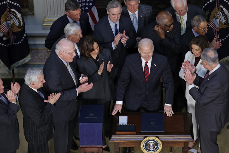 President Biden, Vice President Harris and Democratic leaders at a bill signing
