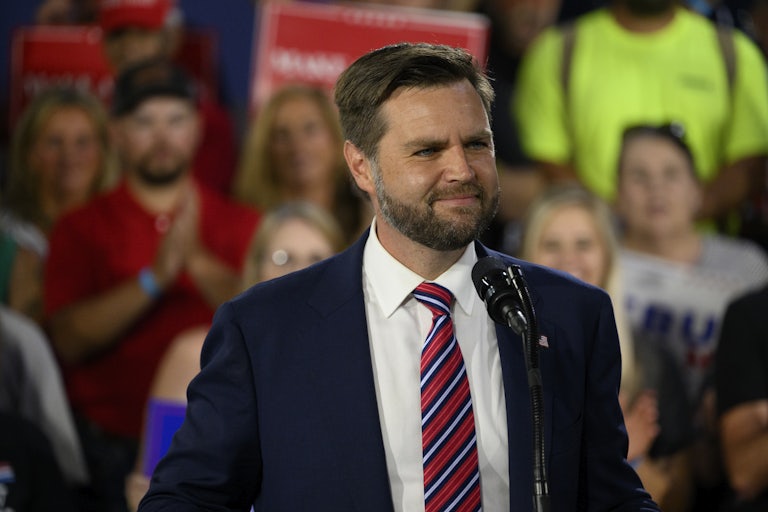 J.D. Vance smiles at a campaign rally