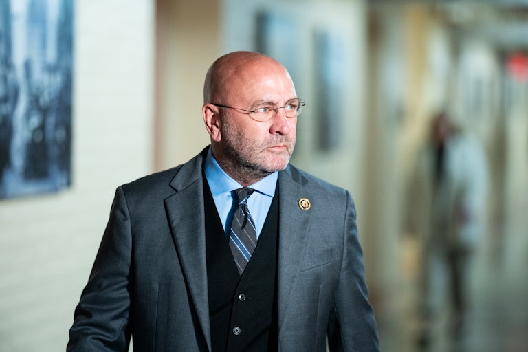 Representative Clay Higgins walks in the Capitol