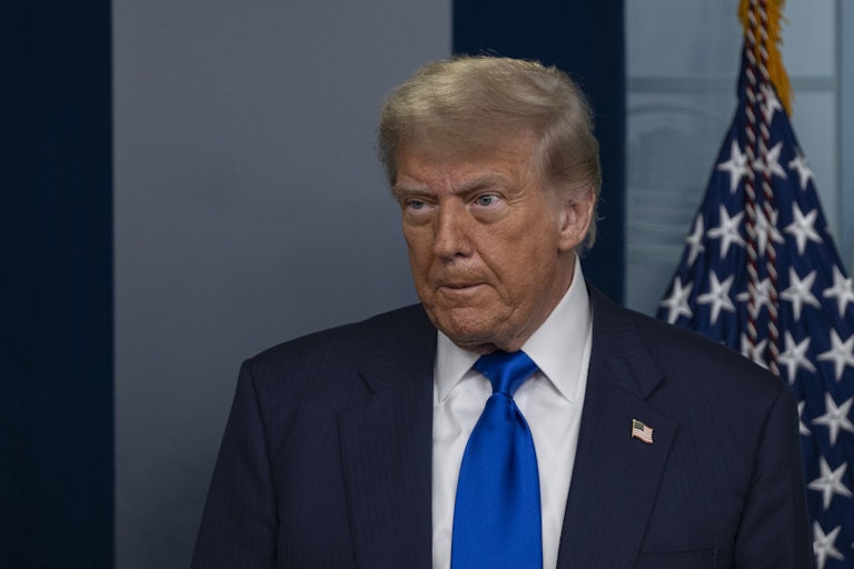 Donald Trump makes a face during a White House press briefing