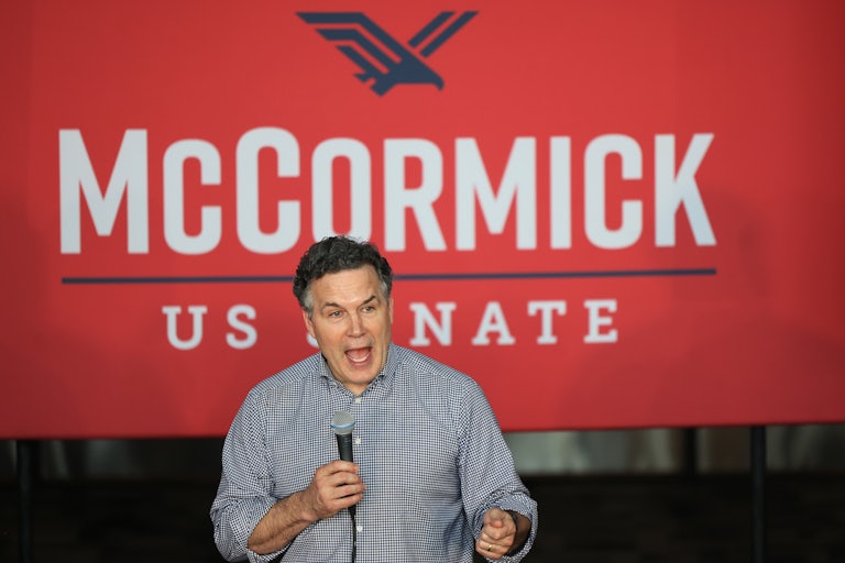 David McCormick speaks into a microphone