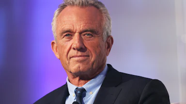 robert f. kennedy jr does that weird little ominous smirk he does