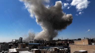 Plumes of smoke rise following explosions in Tehran