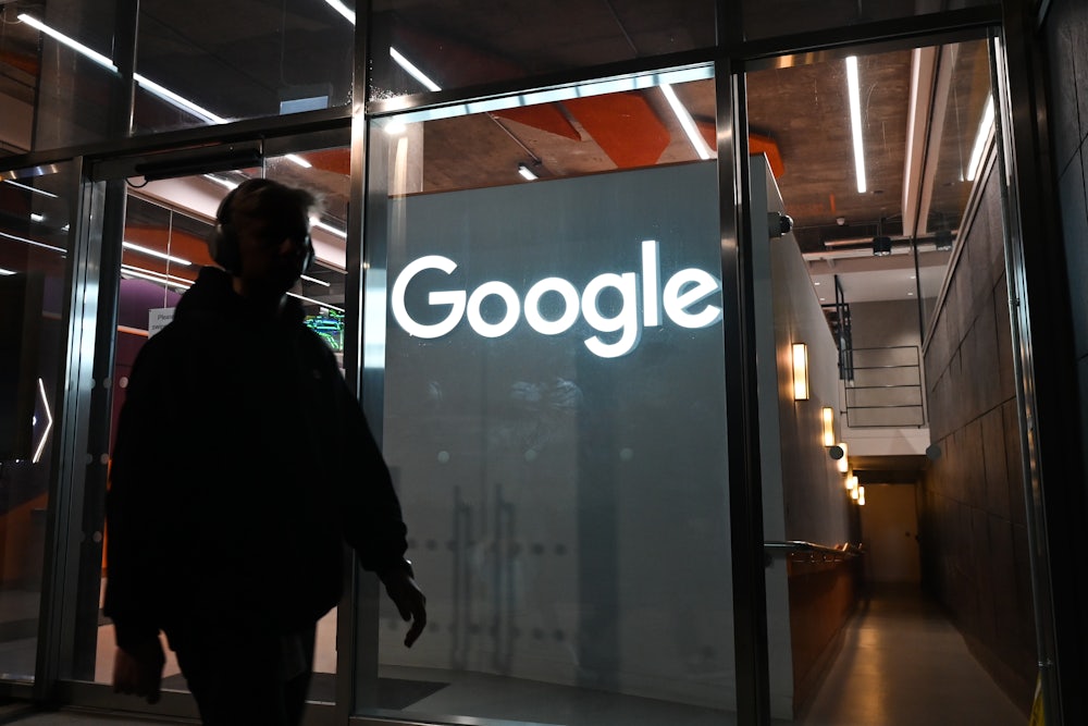 A person walks past the entrance to a Google building in Dublin, Ireland.